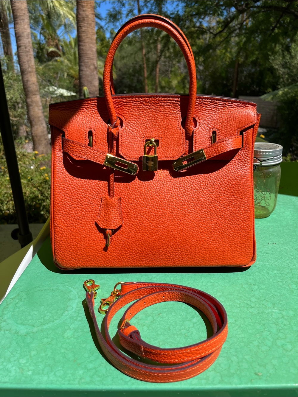 Structured orange Leather Wirkin Satchel with Removable Strap and Gold Accents
